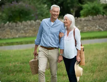 adorable-senior-couple-being-affectionate-while-taking-walk